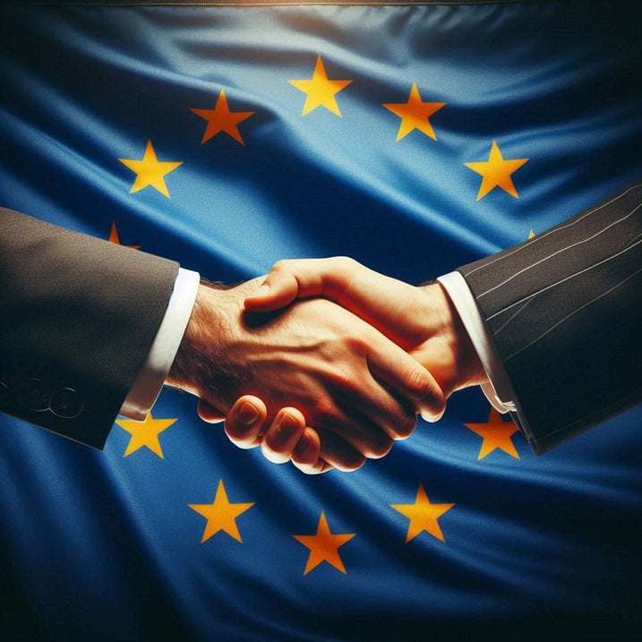 A handshake, flag of the European Union in background.